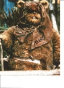 Michael Henbury 10x8 signed Ewok Star Wars colour photo. Michael Henbury Ballan was born on November