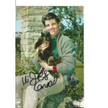 Jess Conrad signed colour 6x4 postcard. Good Condition. All autographs are genuine hand signed and