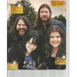 Romeo, Angela, Michele of The Magic Numbers signed colour magazine page, stuck to card. Good