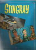 Gerry Anderson signed book of 20 colour Stingray postcards. Signed on front cover. Good Condition.