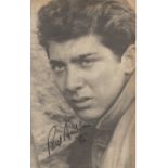 Paul Anka signed black and white newspaper photo. Good Condition. All autographs are genuine hand