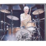 Rolling Stones Charlie Watts signed 10 x 8 inch photo. of the legendary drummer in action. Good