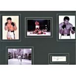 Muhammad Ali signature piece mounted with 4 photos. Approx overall size 20x12. Good Condition. All