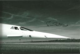 Norman Britton Concorde Pilot signed 12x8 b/w photo. Good Condition. All autographs are genuine hand