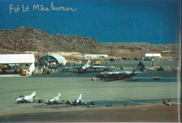 Flt LT Mike Pearson signed 12x10 inch colour photo of airfield with grounded Bomber Planes. Good