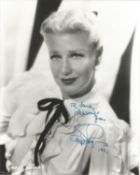 Ginger Rogers Signed 10 x 8 inch b/w photo to Nora. Condition 8/10. All autographs are genuine