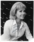 Debbie Reynolds Signed 10 x 8 inch b/w photo. Condition 7/10. All autographs are genuine hand signed