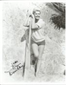 Doris Day Signed 10 x 8 inch b/w full length photo. Condition 9/10. All autographs are genuine