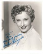 Barbara Stanwyck Signed 10 x 8 inch b/w photo to Nora. Condition 8/10. All autographs are genuine