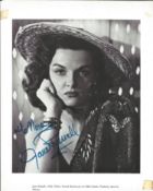 Jane Russell Signed vintage 10 x 8 inch b/w magazine photo, couple of tape marks to white border.