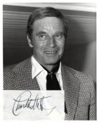 Charlton Heston Signed sticker on photo print black and white 10 x 8 inch. Condition report out of