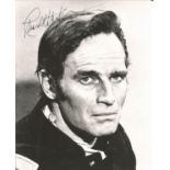 Charlton Heston Signed 10 x 8 inch b/w photo, in Western outfit, slight crease on forehead.