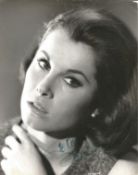 Stefanie Powers signed vintage 10 x 8 inch b/w photo, To Nora which is slightly smudged. Condition
