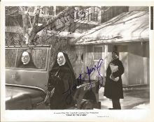 Loretta Young and Celeste Holm signed 10 x 8 inch b/w photo from Come to the Stable. Condition 7/10.