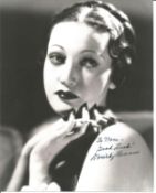 Dorothy Lamour Signed 10 x 8 inch b/w photo to Nora, slight creasing down LH edge. Condition 8/10.