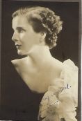 Diana Wynyard Signed 6 x 4 sepia photo mounted to card. Condition 6/10. All autographs are genuine