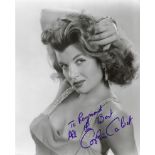 Corinne Calvet Signed 10 x 8 inch b/w sexy portrait photo To Raymond. Condition 10/10. All