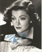 Myrna Loy Signed 10 x 8 inch b/w photo to Nora, slight mark at top. Condition 8/10. All autographs