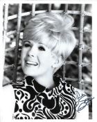 Connie Stevens Signed 10 x 8 inch b/w photo, some creasing. Condition 4/10. All autographs are