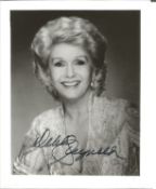 Debbie Reynolds Signed 6 x 4 inch b/w photo. Condition 8/10. All autographs are genuine hand