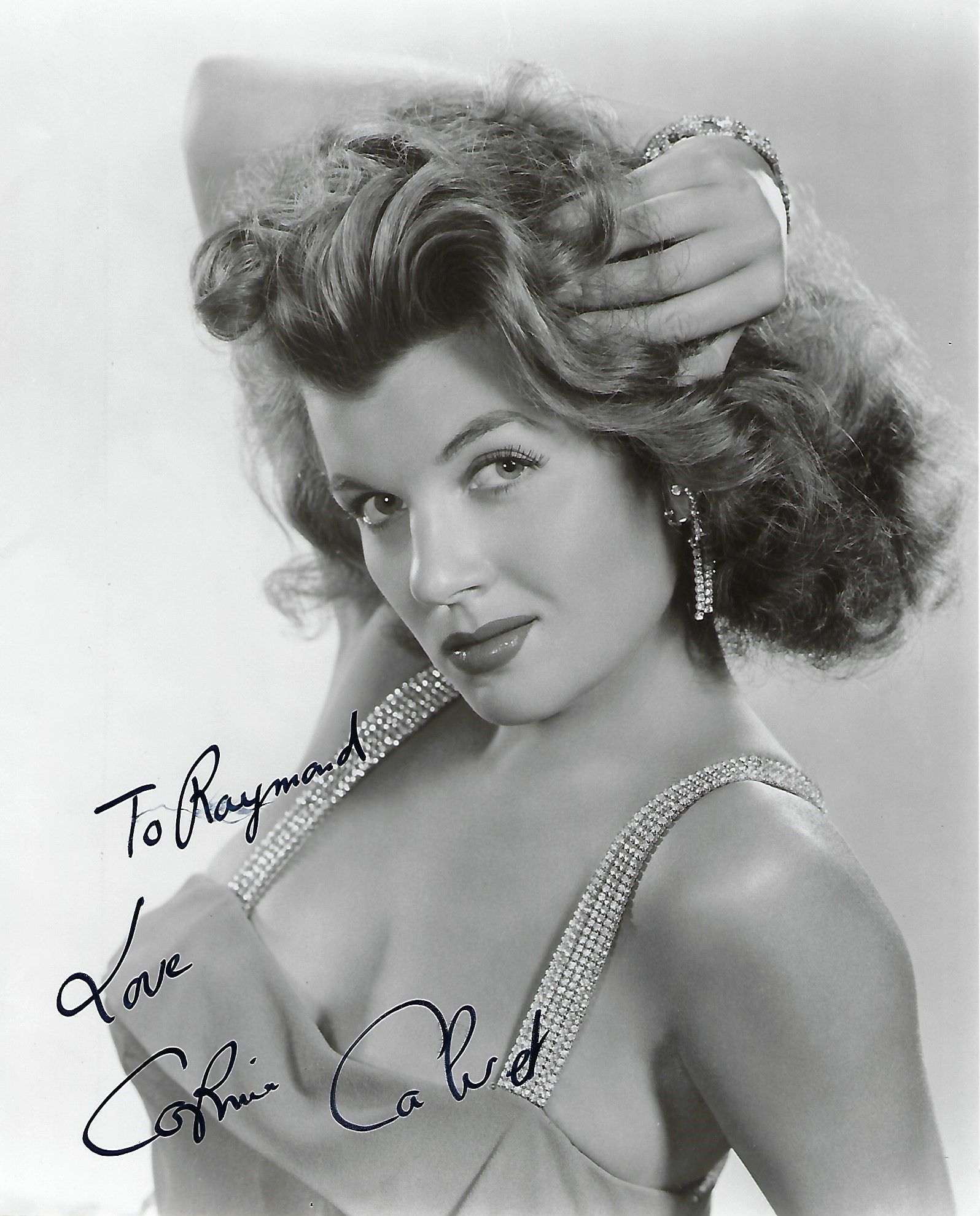 Corinne Calvet Signed 10 x 8 inch b/w sexy portrait photo To Raymond. Condition 8/10. All autographs