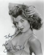 Corinne Calvet Signed 10 x 8 inch b/w sexy portrait photo To Raymond. Condition 8/10. All autographs