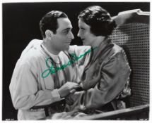 Irene Dunne Signed 10 x 8 inch vintage b/w photo from Symphony of Six Million with Ricardo Cortez.