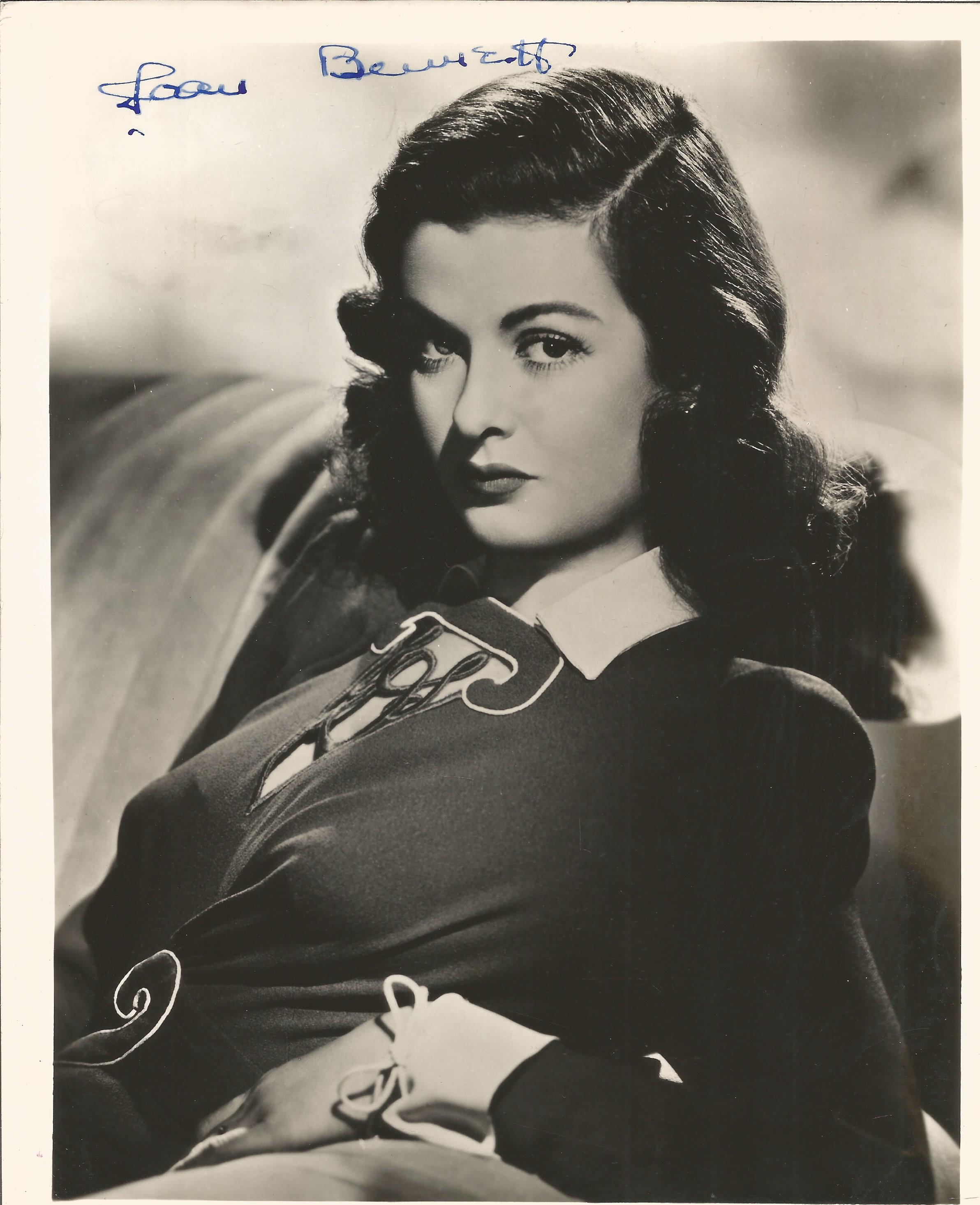 Joan Bennett signed vintage 10 x 8 inch b/w young portrait photo. Condition 7/10. All autographs are