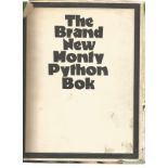 The Brand New Monty Python. Large unsigned hardback book with dust jacket printed in Great Britain