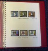 GB stamp collection over 30 pages of unmounted mint stamps housed in red stamp album dated between