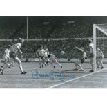 TREVOR BROOKING football autographed 12 x 8 photo, a superb image depicting the West Ham United