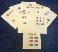 British Commonwealth collection 8 loose sheets mint and used includes Pitcairn Islands, Rhodesia,