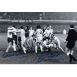 HUNTER v LEE 'THE FIGHT' football autographed 12 x 8 photo, a superb image depicting NORMAN HUNTER