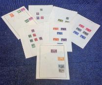 British Commonwealth stamp collection 7 loose sheets mint and used includes Sarawak, Seychelles,