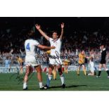 WEST HAM UNITED football autographed 12 x 8 photo, a superb image depicting TREVOR BROOKING, arms