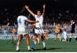 WEST HAM UNITED football autographed 12 x 8 photo, a superb image depicting TREVOR BROOKING, arms