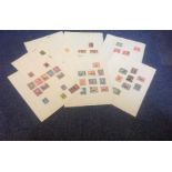 British commonwealth stamp collection on 9 loose album pages, Includes Gambia, Kedah, Kenya and