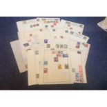 Assorted stamp collection on 14 loose album pages, Includes stamps from Yugoslavia, Ukraine, Latvia,