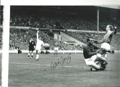 Alex Young Everton Signed 12 x 8 inch football photo. . All autographs are genuine hand signed and