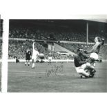 Alex Young Everton Signed 12 x 8 inch football photo. . All autographs are genuine hand signed and