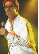 Huey Lewis signed 12 x 8 inch colour music photo. All autographs are genuine hand signed and come