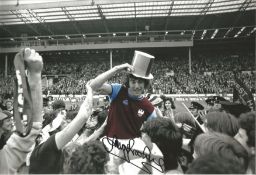 Trevor Brooking West Ham Signed 12 x 8 inch colour enhanced football photo. . All autographs are
