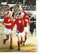 Ray Wilson 66 England Signed 12 x 8 inch football photo. . All autographs are genuine hand signed