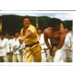 Enter the Dragon John Saxon signed 7 x 5 inch colour action photo from the movie. All autographs are