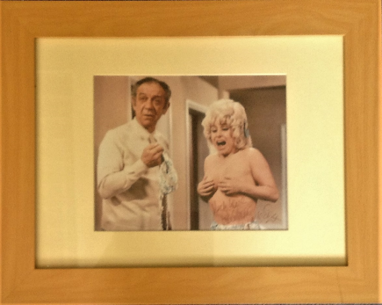 Barbara Windsor signed 10 x 8 inch colour Carry on photo with Sid James. Framed and monuted to