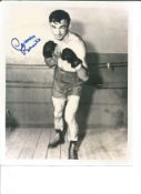 Boxing Carmen Basilio signed 10 x 8 inch b/w full length photo in the ring. All autographs are