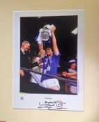 Kevin Ratcliffe signed 20x16 mounted colour photo pictured lifting the FA Cup while captain of