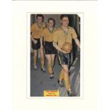 Ron Ashman signed 14x11 mounted colour magazine photo pictured leading Norwich City out. Ronald