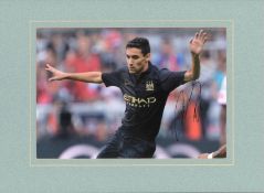 Jesus Navas signed 16x12 overall mounted colour photo pictured in action for Manchester City.