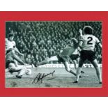 Steve Heighway signed 13x10 mounted black and white photo pictured in action for Liverpool. Good